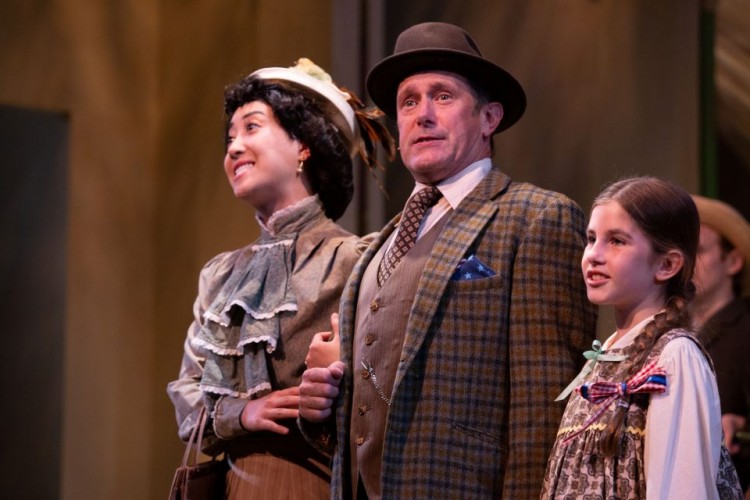 Jasmine Huang, Rob Torr, and Isla Oatway in The Music Man (2022). Directed and Choreographed by Stephanie Graham; Music Direction by Rachel Cameron; Assistant Choreographed by Keleshaye Christmas-Simpson; Set Design by Brandon Kleiman; Costume Design by Robin Fisher & Joshua Quinlan; Lighting Design by Renee Brode; Sound Design by Deanna Choi; Stage Managed by Jordan Guetter; Assistant Stage Managed by Cristina Hernadez; Apprentice Stage Managed by Arielle Voght. Photo by Randy deKleine-Stimpson.