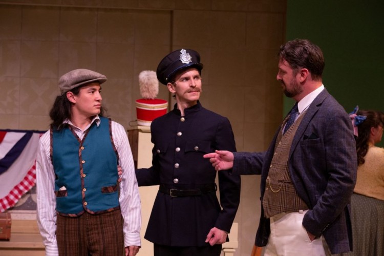 Daniel Yeh, Michael Cox, and David Leyshon in The Music Man (2022). Directed and Choreographed by Stephanie Graham; Music Direction by Rachel Cameron; Assistant Choreographed by Keleshaye Christmas-Simpson; Set Design by Brandon Kleiman; Costume Design by Robin Fisher & Joshua Quinlan; Lighting Design by Renee Brode; Sound Design by Deanna Choi; Stage Managed by Jordan Guetter; Assistant Stage Managed by Cristina Hernadez; Apprentice Stage Managed by Arielle Voght. Photo by Randy deKleine-Stimpson.